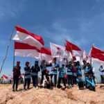 Tepat di Hari Kemerdekaan RI, 145 Anggota PMR Basel Kibarkan Bendera Merah Putih di Eks Lahan Tambang